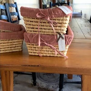 Wicker baskets with red gingham liners.